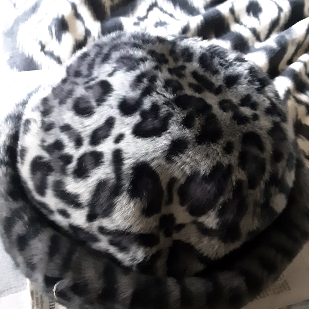 Faux silver leopard print hat for cold weather warmth 19 inches across inside